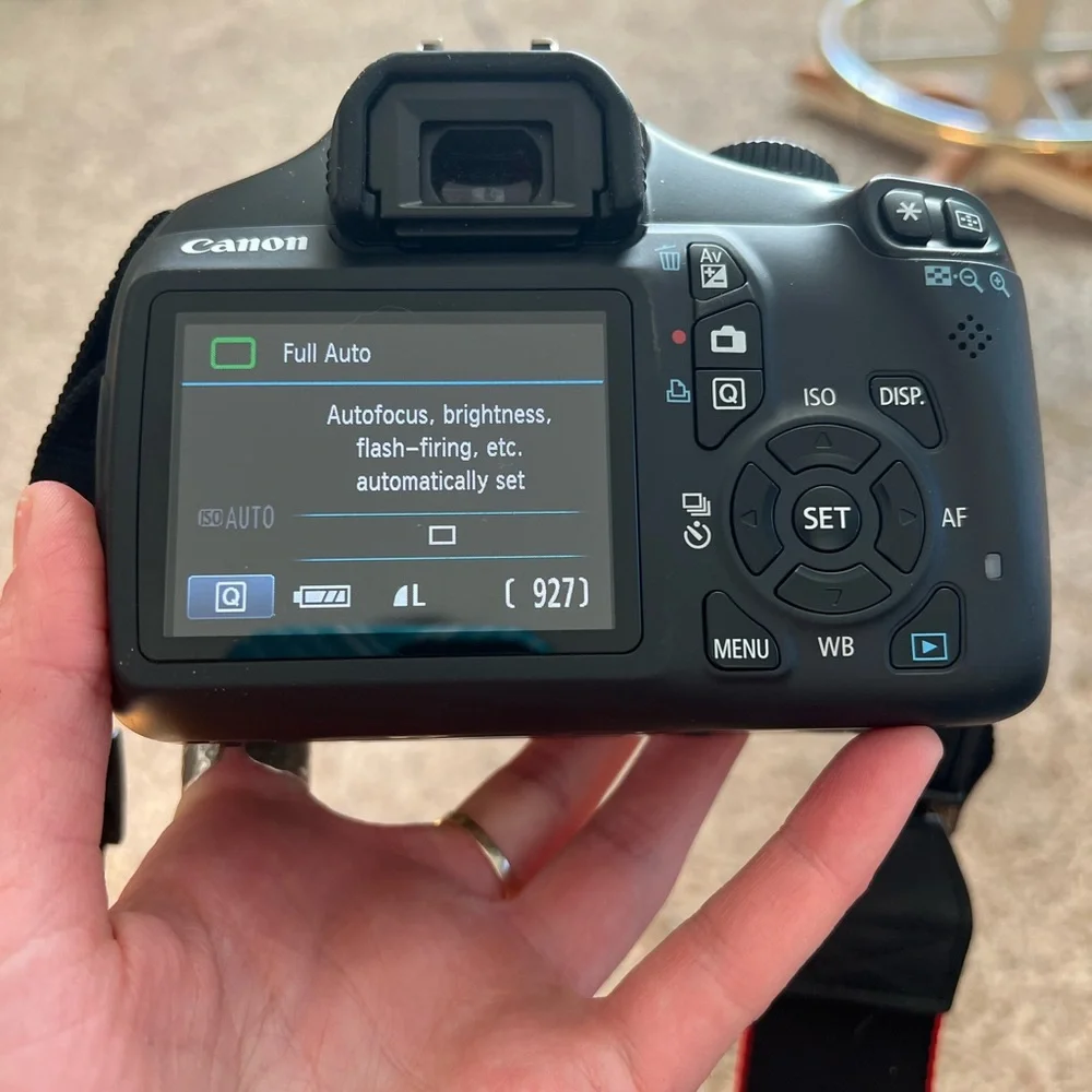 Cannon EOS 1100D camera with a 18-55 mm lens